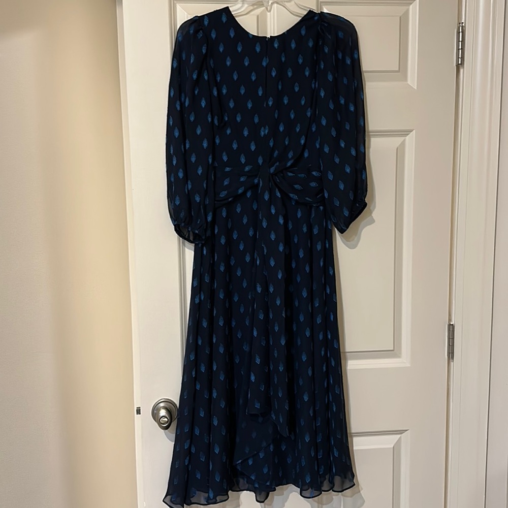 Shoshanna new with tags size 4 navy dress with light blue diamond embroidery.